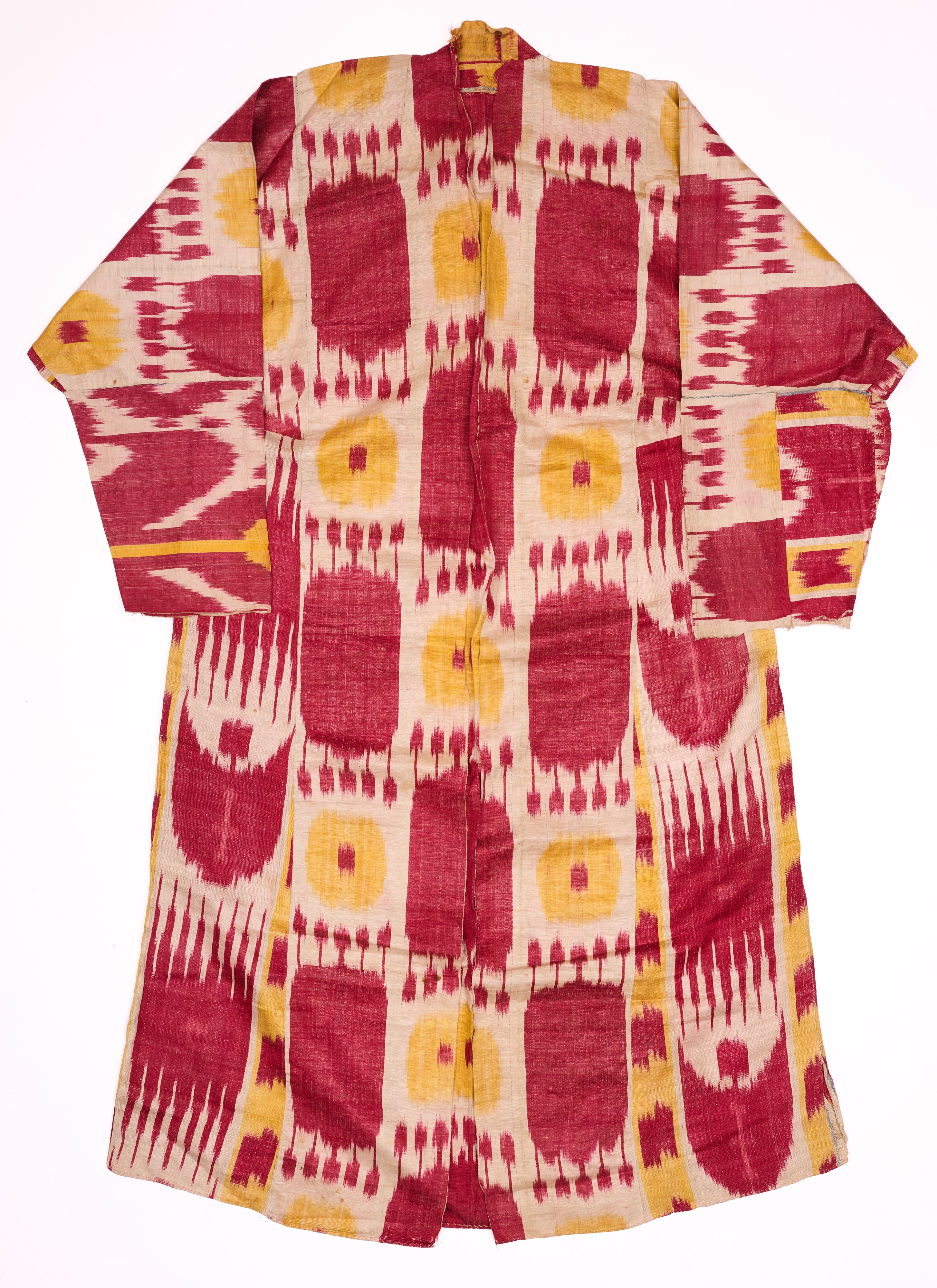 Lot 75 - AN IKAT CHAPAN, UZBEKISTAN, LATE 19TH CENTURY