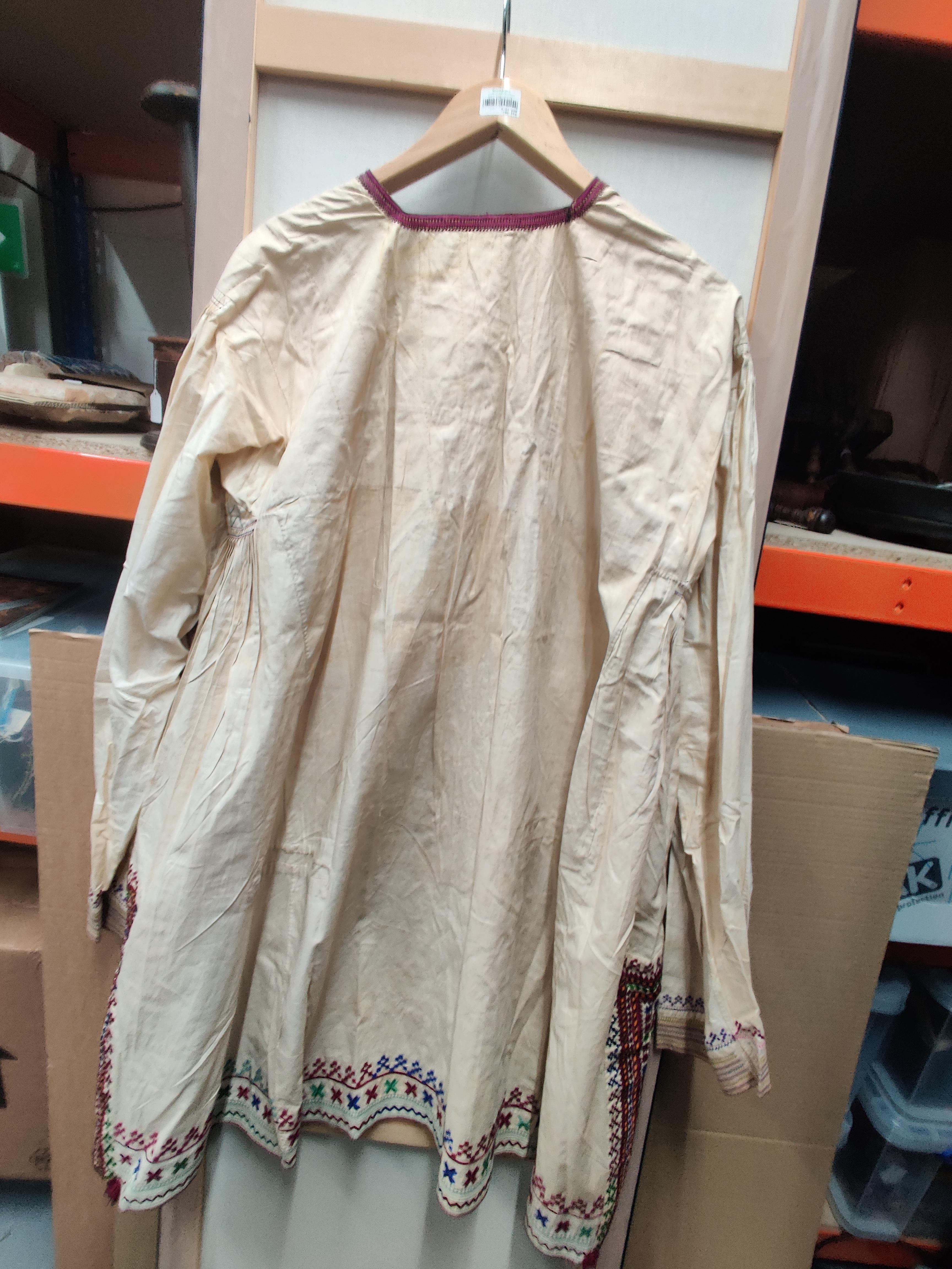 Lot 164 - A HAZARA EMBROIDERED MANS TUNIC, CIRCA 1920,