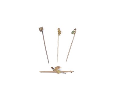 Lot 791 - THREE GOLD STICK PINS