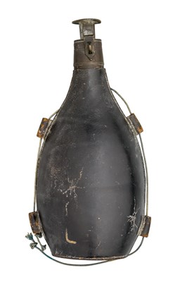 Lot 424 - A LARGE LEATHER POWDER-FLASK
